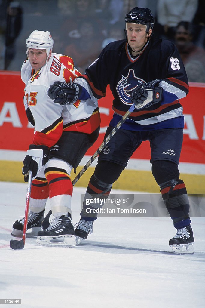 Sami Stylo Defenseman Sami Salo of the Vancouver Canucks covers Martin Gelinas ...
