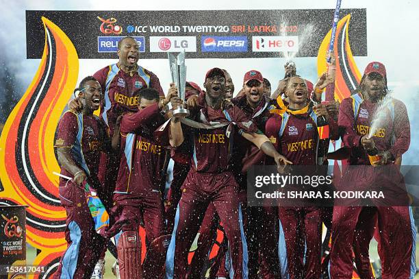 West Indies cricketers celebrate their victory in the ICC Twenty20 Cricket World Cup's final match against Sri Lanka at the R. Premadasa...