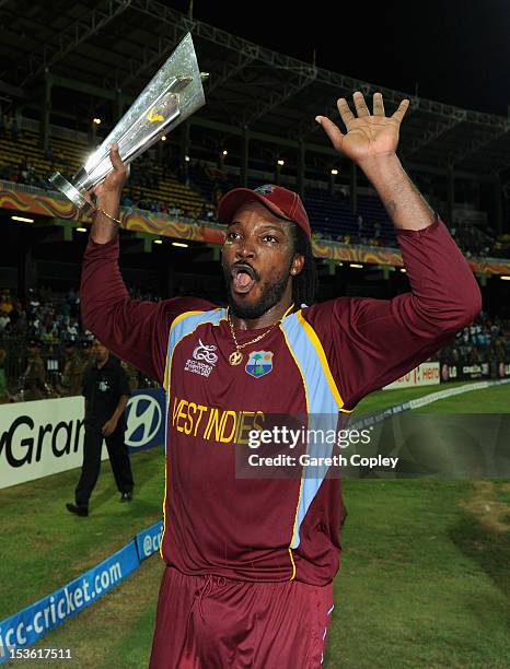 Chris Gayle of the West Indies celebrates with the trophy after winning the ICC World Twenty20 2012 Final between Sri Lanka and the West Indies at R....