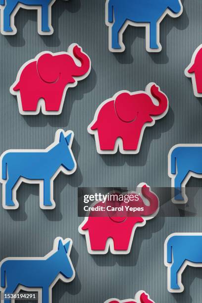 democratic blue donkey and republican red elephant - spanish congress stock pictures, royalty-free photos & images