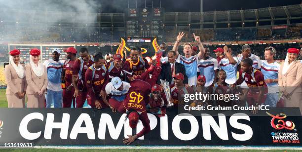 Chris Gayle of West Indies falls over the champions sign in celebration after defeating Sri Lanka in the ICC World Twenty20 2012 Final between Sri...