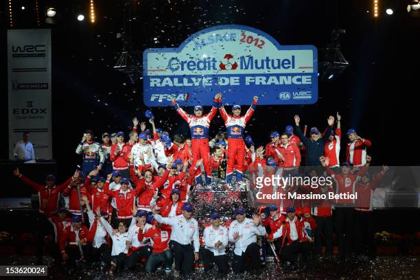 Sebastien Loeb of France and Daniel Elena of Monaco celebrate their nine WRC title with all the Citroen Total WRT members during Day Three of the WRC...