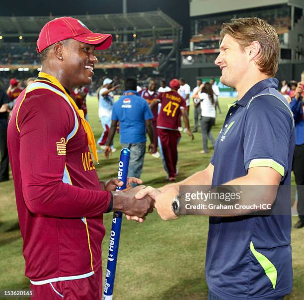 Marlon Samuels of West Indies speaks with player of the tournament Shane Watson after defeating Sri Lanka in the ICC World Twenty20 2012 Final...