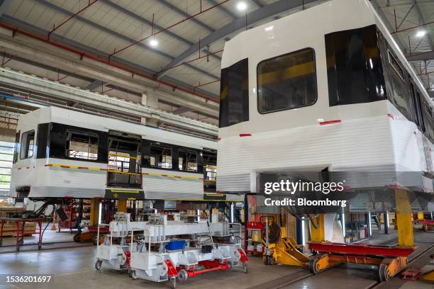 Train cars are refurbished at the Medellin Metro train factory in Medellin, Colombia, Friday, July 14, 2023. The city of Medellin is modernizing...