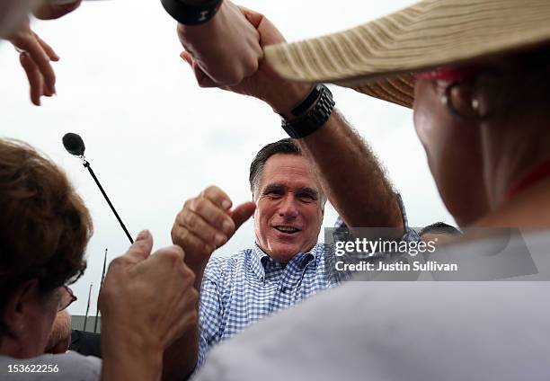 Republican presidential candidate, former Massachusetts Gov. Mitt Romney greets supporters during a rally at Tradition Town Square on October 7, 2012...