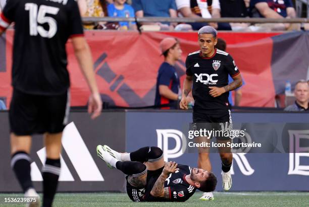 United right back Andy Najar comes to the aid of second striker Taxiarchis Fountas during a match between the New England Revolution and DC United on...