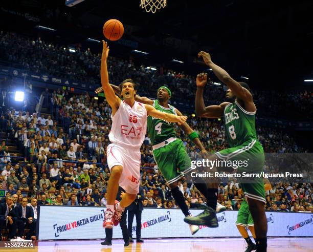 Gianluca Basile of Armani competes with Jeff Green and Jason Terry of Celtics during the NBA Europe Live game between EA7 Emporio Armani Milano v...