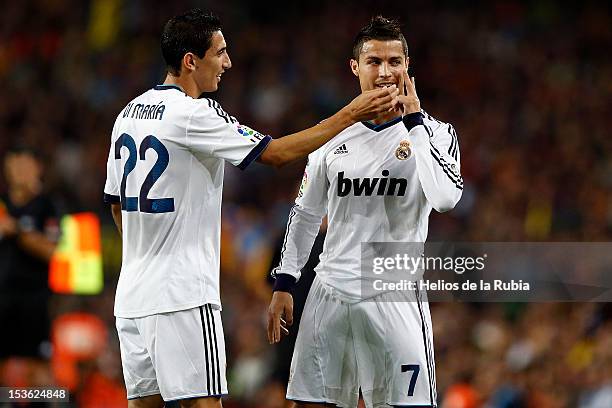 Cristiano Ronaldo and Angel Di Maria celebrates after scoring a goal during the la Liga match between FC Barcelona and Real Madrid at the Camp Nou...