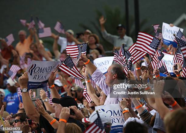 Supporters of Republican presidential candidate, former Massachusetts Gov. Mitt Romney cheer during a victory rally at Tradition Town Square on...