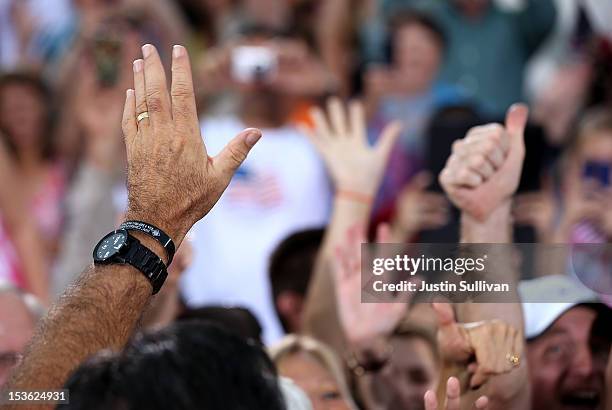 Republican presidential candidate, former Massachusetts Gov. Mitt Romney waves to supporters during a victory rally at Tradition Town Square on...