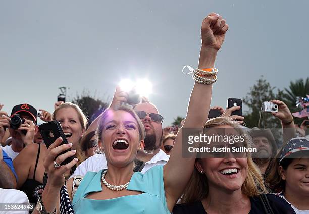 Supporters of Republican presidential candidate, former Massachusetts Gov. Mitt Romney cheer during a victory rally at Tradition Town Square on...