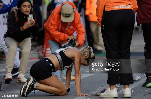 Citlali Cristian Moscote, women's category, collapses at the finish line to take second place with 1h 16m 00s during the BBVA Mexico City Half...