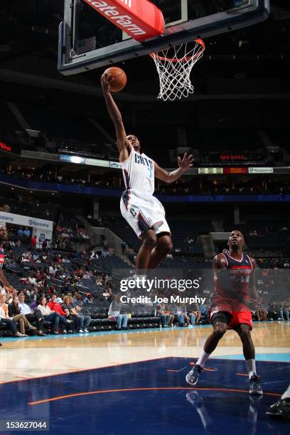 Ramon Sessions of the Charlotte Bobcats goes to the basket during the game between the Charlotte Bobcats and the Washington Wizards at the Time...