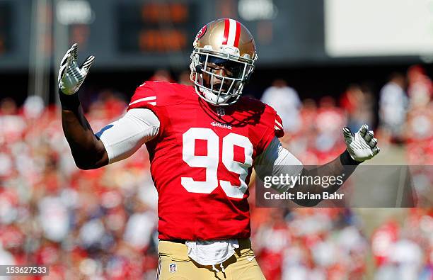 Linebacker Aldon Smith of the San Francisco 49ers tries to amp up the crowd before a snap by the Buffalo Bills in the first quarter on October 7,...