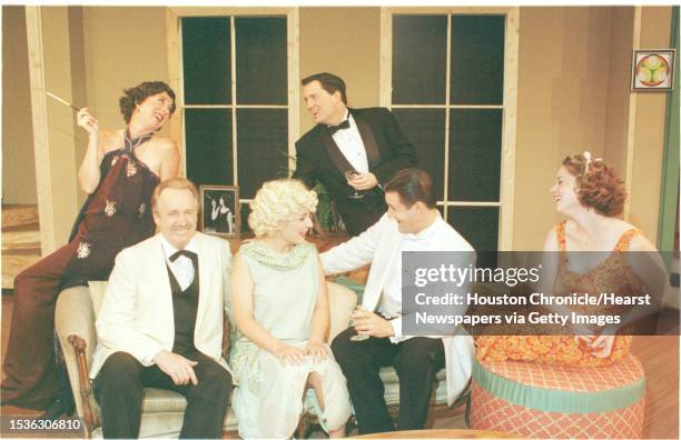 Main Street Theater at Chelsea Market production of "Hay Fever." On back of sofa l-r Charlene E. Hudgins, Andrew B. Rughven. Seated in front l-r John...