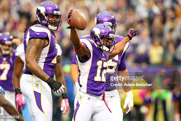 Percy Harvin of the Minnesota Vikings celebrates a touchdown against the Tennessee Titans at the Hubert H. Humphrey Metrodome on October 7, 2012 in...