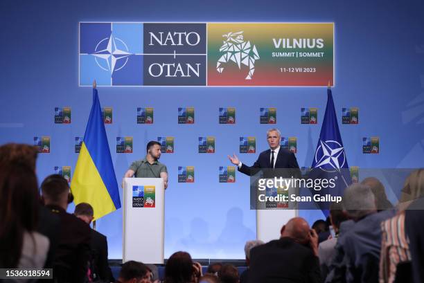 Ukrainian President Volodomyr Zelensky and NATO Secretary General Jens Stoltenberg speak to the media on the second day of the 2023 NATO Summit on...