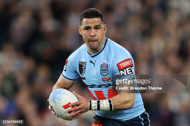 Cody Walker of the Blues runs the ball during game three of the State of Origin series between New South Wales Blues and Queensland Maroons at Accor...