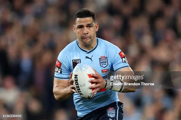 Cody Walker of the Blues runs the ball during game three of the State of Origin series between New South Wales Blues and Queensland Maroons at Accor...