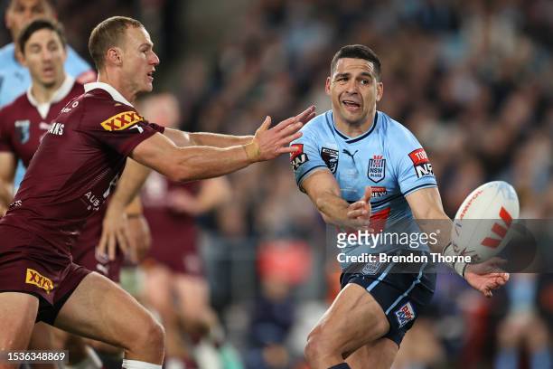 Cody Walker of the Blues passes the ball during game three of the State of Origin series between New South Wales Blues and Queensland Maroons at...