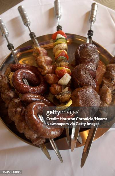 Sword with grilled meats are featured at Avenida Paulista, a Brazilian style rodizio/buffet on Westheimer between Chimney Rock and Fountain View....