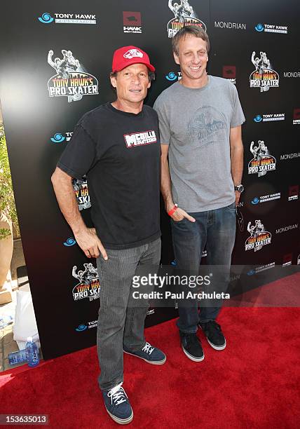 Pro Skateboarders Mike McGill and Tony Hawk attend the 9th annual Stand Up For Skateparks benefit at Ron Burkle’s Green Acres Estate on October 7,...