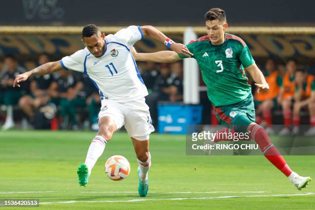 Panama's forward Ismael Diaz and Mexico's defender Cesar Montes vie for the ball during the Concacaf 2023 Gold Cup final football match between...