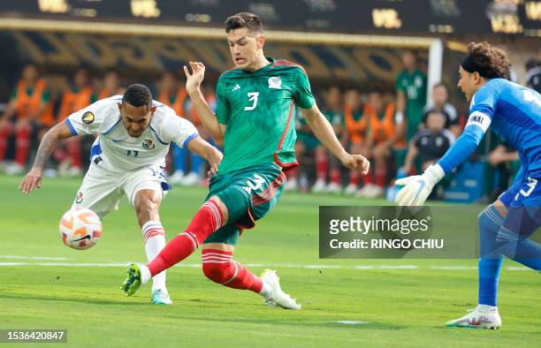 Mexico's defender Cesar Montes and Panama's forward Ismael Diaz vie for the ball during the Concacaf 2023 Gold Cup final football match between...