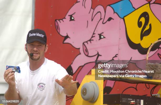 Swine Master" Zach Johnson is the announcer at the Pig Races at the Houston Livestock Show and Rodeo. Photo by Steve Campbell 2005 Houston Livestock...