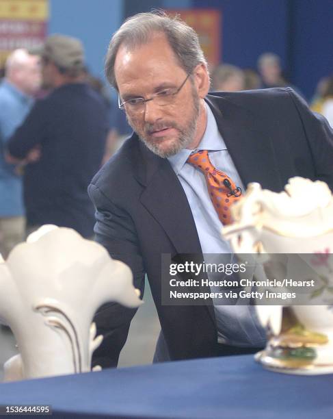 David Lackey appraises some items that have been chosen for airing on the PBS show Antiques Roadshow. Lackey is a local appraiser who is one of the...