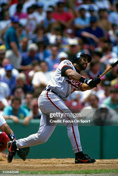 Harold Baines of the Baltimore Orioles bats against the Boston Red Sox during an Major League Baseball game circa 1994 at Fenway Park in Boston,...