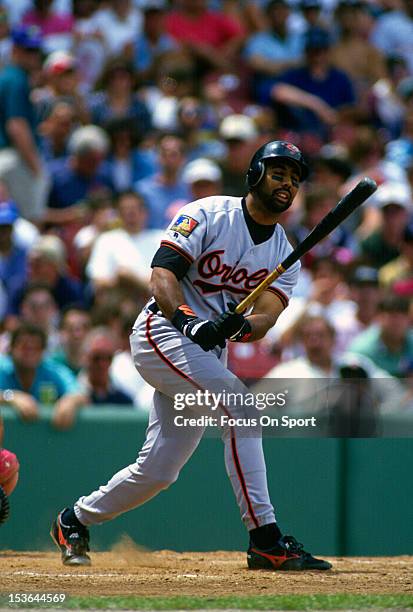 Harold Baines of the Baltimore Orioles bats against the Boston Red Sox during an Major League Baseball game circa 1994 at Fenway Park in Boston,...