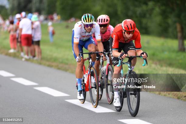 Daniel Oss of Italy and Team TotalEnergies, Andrey Amador of Costa Rica and Team EF Education-EasyPost and Matis Louvel of France and Team...