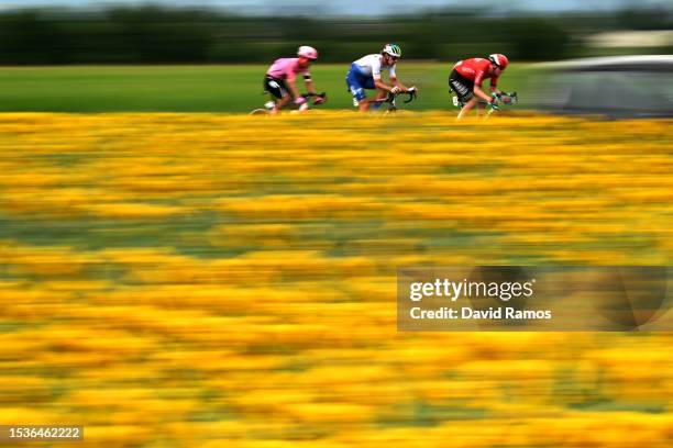 Andrey Amador of Costa Rica and Team EF Education-EasyPost, Daniel Oss of Italy and Team TotalEnergies and Matis Louvel of France and Team...