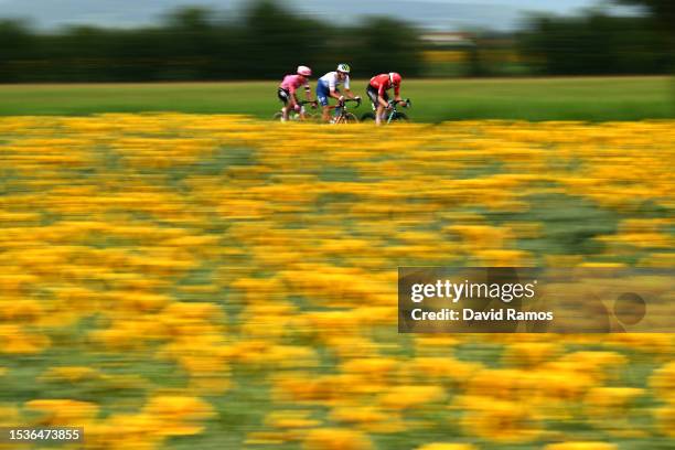 Andrey Amador of Costa Rica and Team EF Education-EasyPost, Daniel Oss of Italy and Team TotalEnergies and Matis Louvel of France and Team...