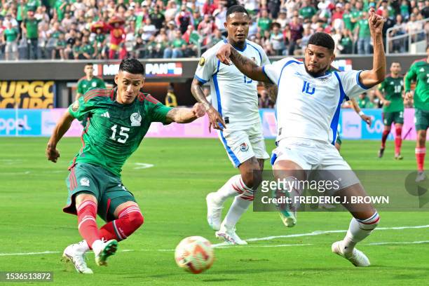 Panama's midfielder Andres Andrade and Mexico's forward Uriel Antuna vie for the ball during the Concacaf 2023 Gold Cup final football match between...