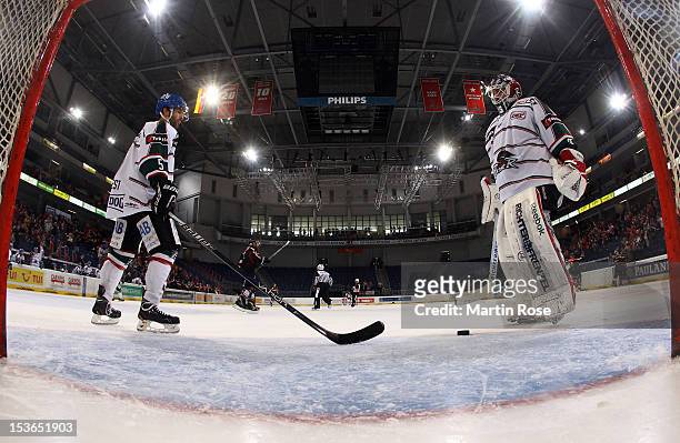 Patrick Ehelechner , goaltender of Augsburg and team mate Jusitn Forrest look dejected during the DEL match between Hannover Scorpions and Augsburger...