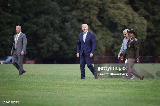 President Joe Biden, center, and First Lady Jill Biden, second right, arrive at Fort Lesley J. McNair in Washington, DC, US, on Sunday, July 16,...