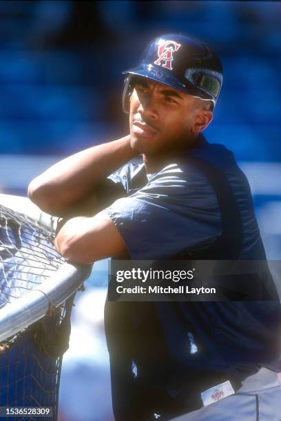 Garrett Anderson of the California Angles looks on during batting practice prior to a baseball game against the New York Yankees on May 19, 1995 at...