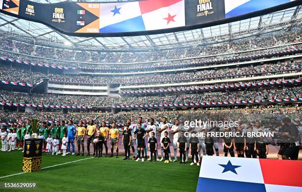 Mexico players and Panama players stand for their national anthem ahead of the Concacaf 2023 Gold Cup final football match between Mexico and Panama...