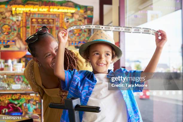family fun at the arcade - herne bay stock pictures, royalty-free photos & images