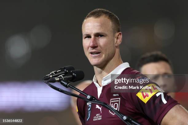 Daly Cherry-Evans of the Maroons addresses the crowd after game three of the State of Origin series between New South Wales Blues and Queensland...