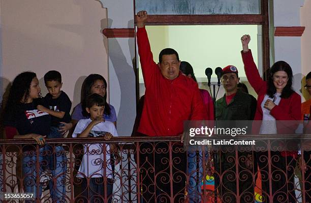 Venezuelan President Hugo Chavez celebrates after winning the presidential elections on October 07, 2012 in Caracas, Venezuela. Chavez won with...