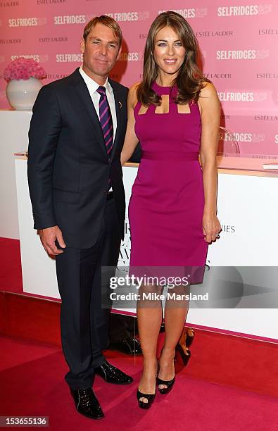 Elizabeth Hurley and Shane Warne meet fans and signs Estee Lauder products during Breast Cancer Awareness Month at Selfridges on October 8, 2012 in...