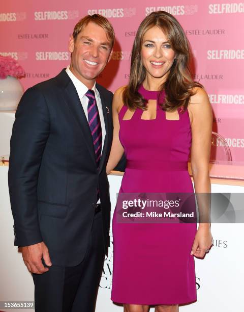 Elizabeth Hurley and Shane Warne meet fans and signs Estee Lauder products during Breast Cancer Awareness Month at Selfridges on October 8, 2012 in...