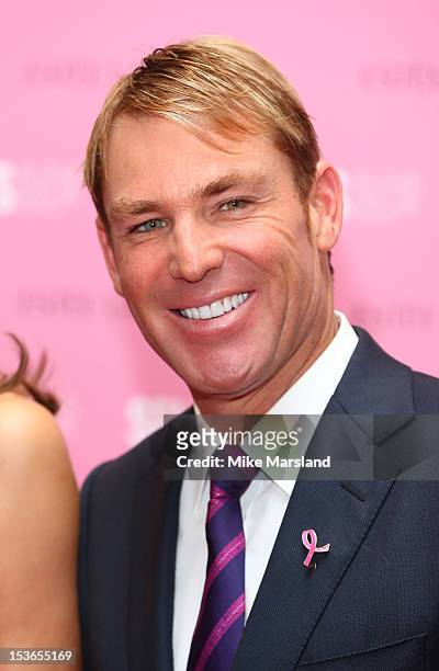 Shane Warne meets fans and signs Estee Lauder products during Breast Cancer Awareness Month at Selfridges on October 8, 2012 in London, England.