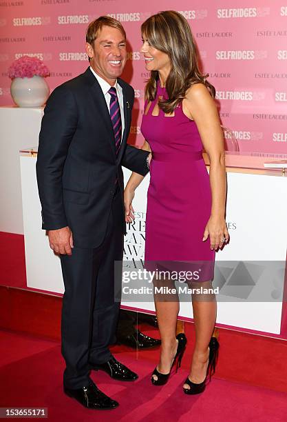 Elizabeth Hurley and Shane Warne meet fans and signs Estee Lauder products during Breast Cancer Awareness Month at Selfridges on October 8, 2012 in...