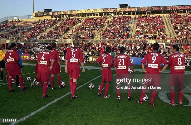 The Chicago Fire stand on the field before the MLS playoff game against the New England Revolution on September 29, 2002 at Cardinal Stadium in...