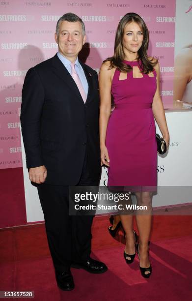 William Lauder and Elizabeth Hurley attend a Photocall for Estee Lauder during Breast Cancer Awareness Month at Selfridges on October 8, 2012 in...