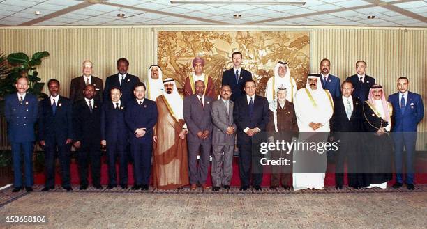 Picture taken in Cairo on 22 October 2000 at the end of the first Arab Summit in four years shows: Arab League Secretary General Esmat Abdel Meguid,...